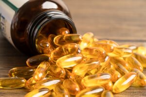 Image shows fish oil which is one of the supplement for knee pain treatment Klinik Tuah 