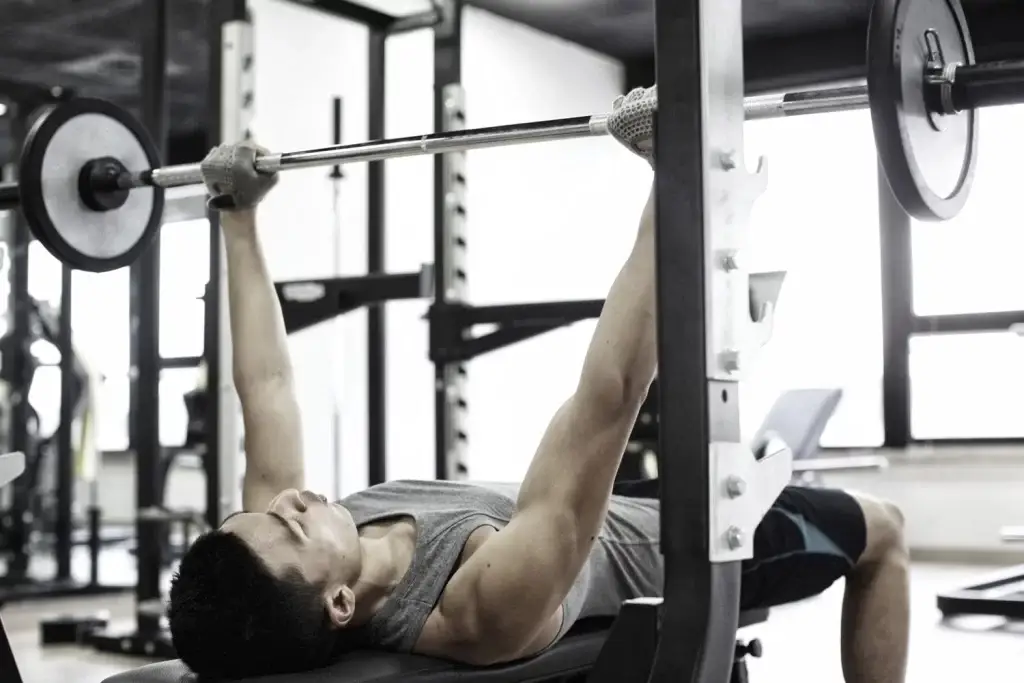 person doing weightlifting which is bad during post circumcision care